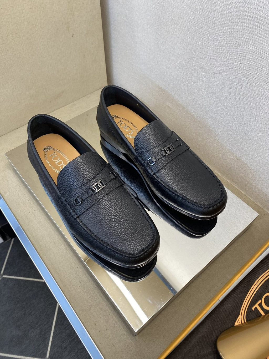 Tod's Black Leather Penny Loafers